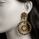 Naqsh-e-Qamar Onyx earrings close-up on a mannequin