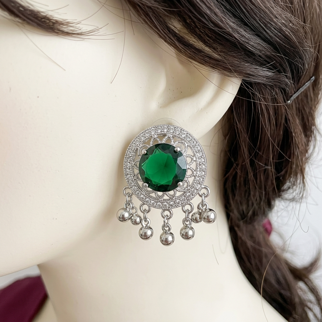 Raqs Emerald Green earrings close-up on a mannequin