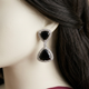 Zavia Onyx earrings close-up on a mannequin