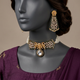 Daricha CS-74 Emerald Green choker set on a charcoal mannequin in aubergine formalwear